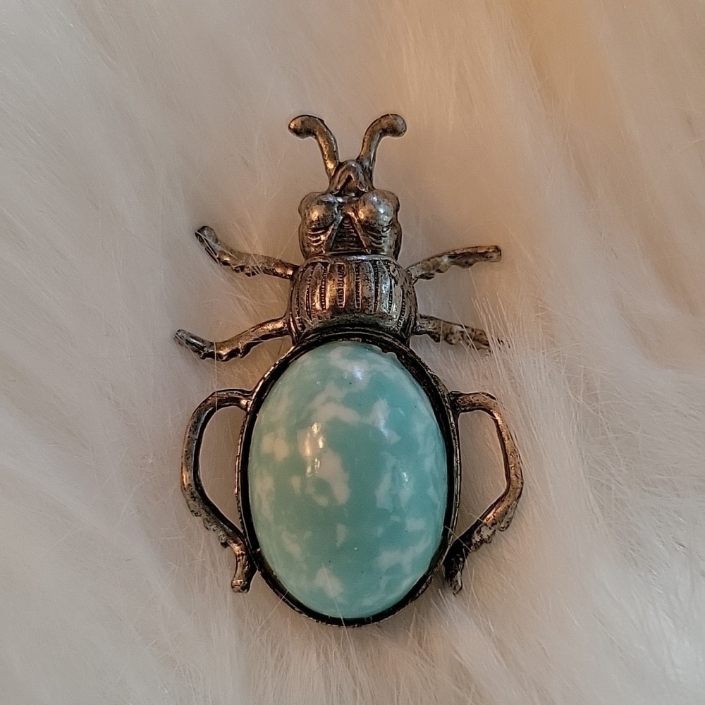 Small VINTAGE silver beetle with a turquise stone pin.